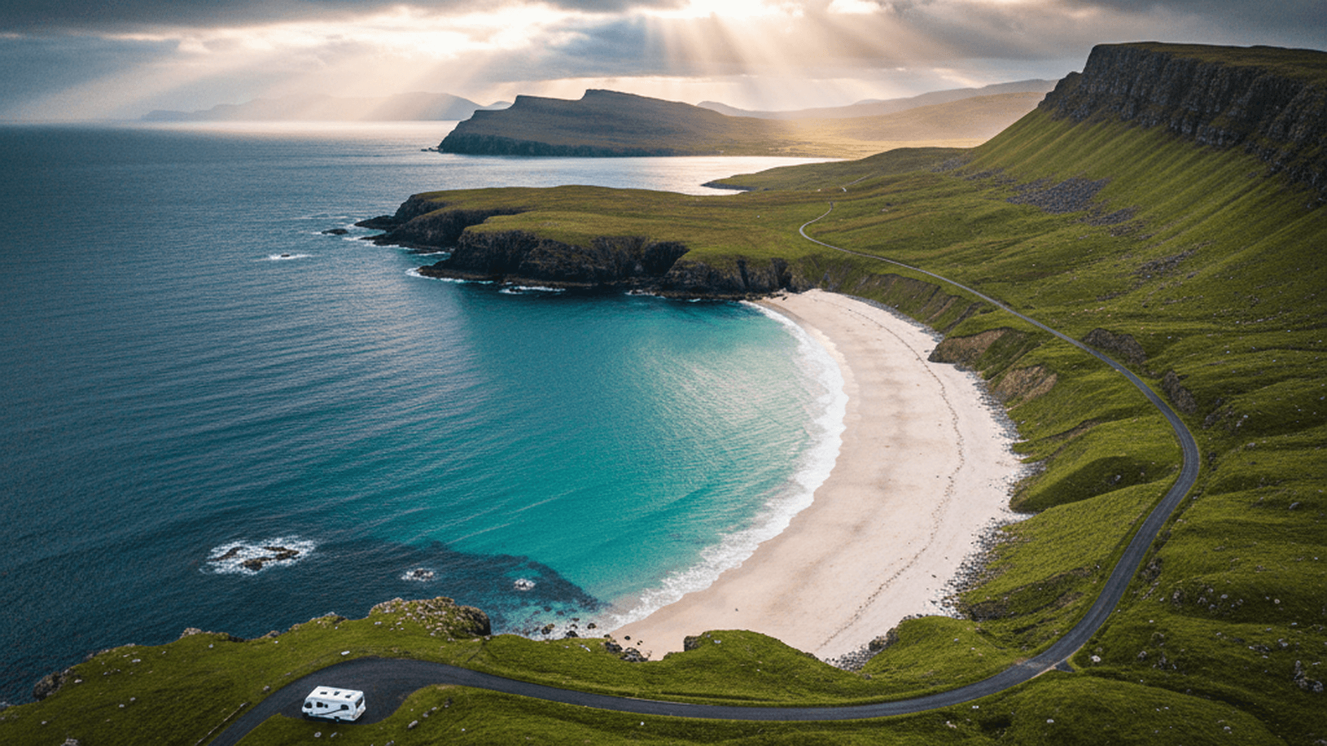 Scottish coastline with white sandy beach and turquoise sea